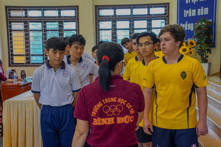 students participating in short-term service activity in Vietnam